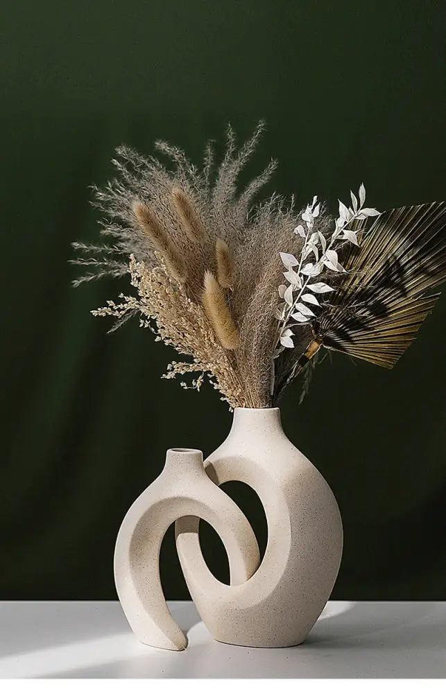 Cream-colored DecorBites™ large 21cm ceramic vase with modern abstract interlocking curves and open circular cutout for home decor