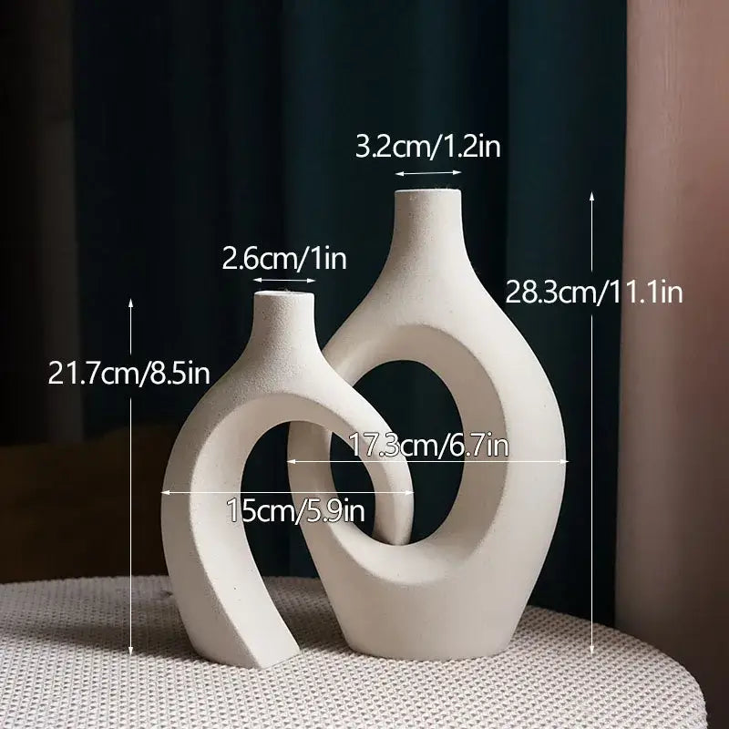 Cream-colored large 21cm ceramic vase with sleek modern curves and open circular design for home decor by decorbites