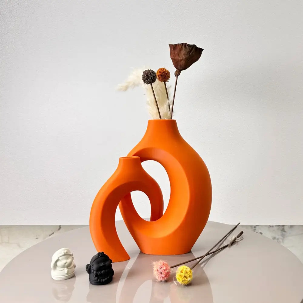Vibrant orange ceramic large dried vase with a modern abstract design in the DecorBites™ dried vase set for home and office