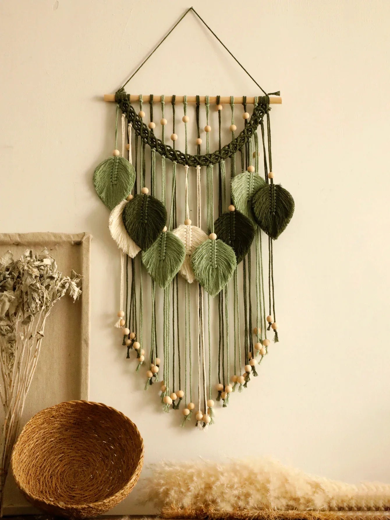 Decorbites™ leaf macrame wall hanging with green and cream woven leaf charms on wooden dowel with beads for boho decor