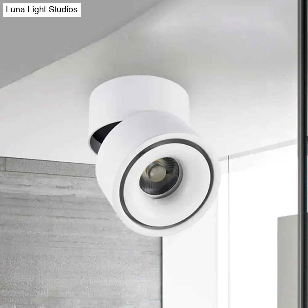 Modern black and white round led flush mount spotlight with metallic shade and black accent ring for bedroom lighting