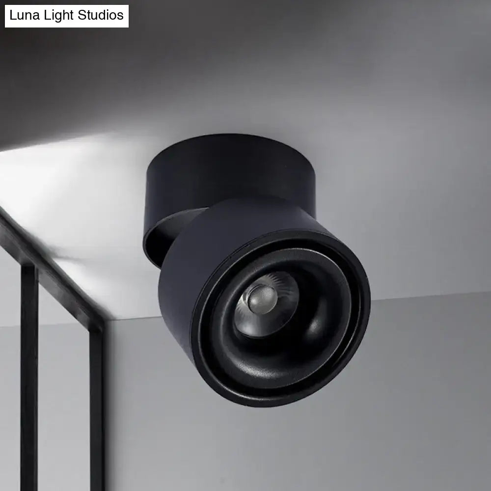 Modern black and white round led flush mount with a black matte metallic shade and adjustable color temperature for bedrooms