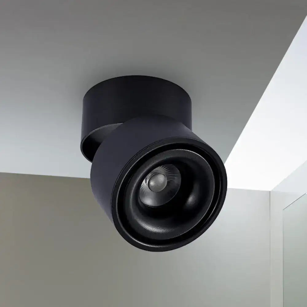 Modern black and white round led flush mount with black matte metallic shade and adjustable spotlight fixture ceiling mount