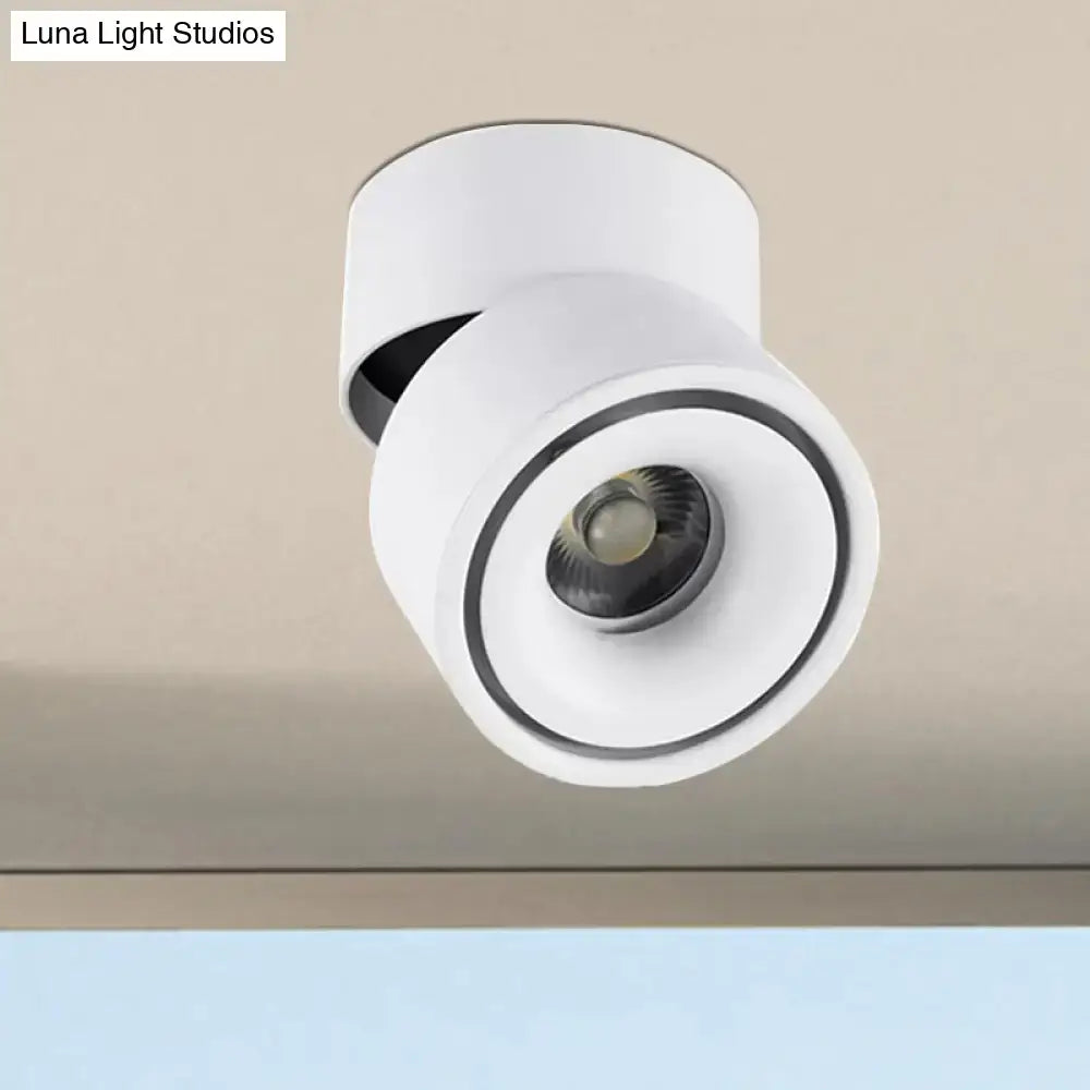 Modern black and white round led flush mount spotlight with metallic shade and adjustable color temperature for bedrooms