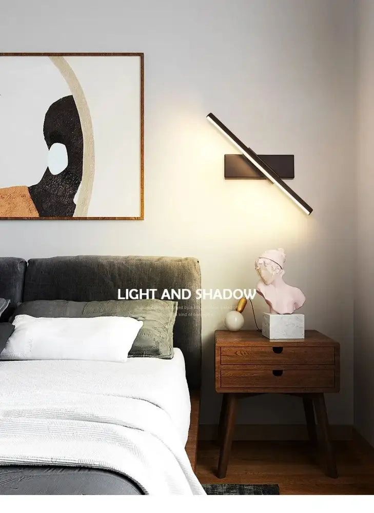 Modern bedroom interior featuring decorbites™ led black rechargeable wall sconce with usb type-c and remote control light source