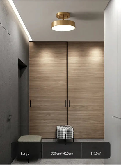 Gold-toned circular led ceiling light with sleek modern design from decorbites for bedroom and living room use