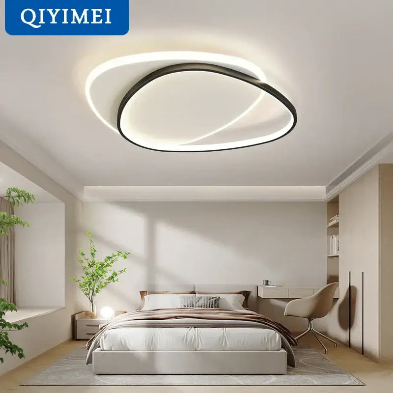 Modern minimalist decorbites led ceiling light with black and white concentric rings emitting soft glow for versatile use