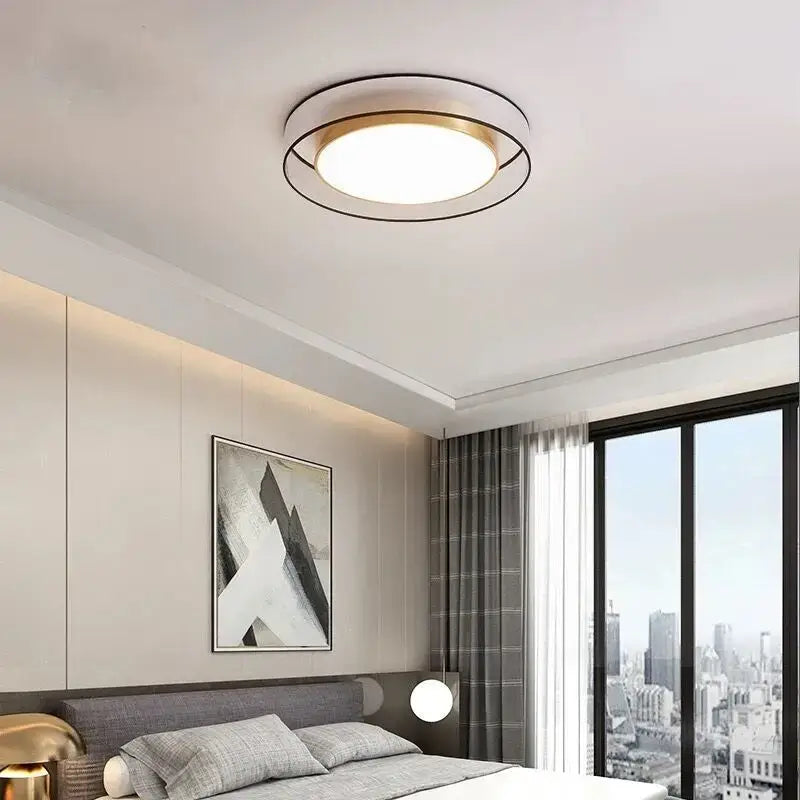 Modern DecorBites LED ceiling lights dimmable with black and gold concentric rings and warm glow for bedroom lighting