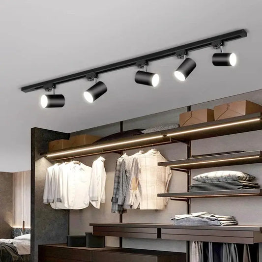 Black cylindrical decorbites led ceiling lights mounted on a ceiling rail for nordic home indoor lighting