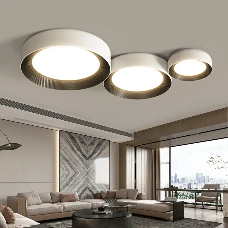 Modern white and gold circular decorbites led ceiling light fixture with sleek minimalist design for indoor use