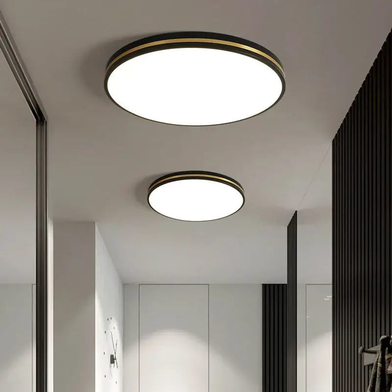 Modern circular ceiling light with black metal frame and gold trim from DecorBites led ceiling lights collection