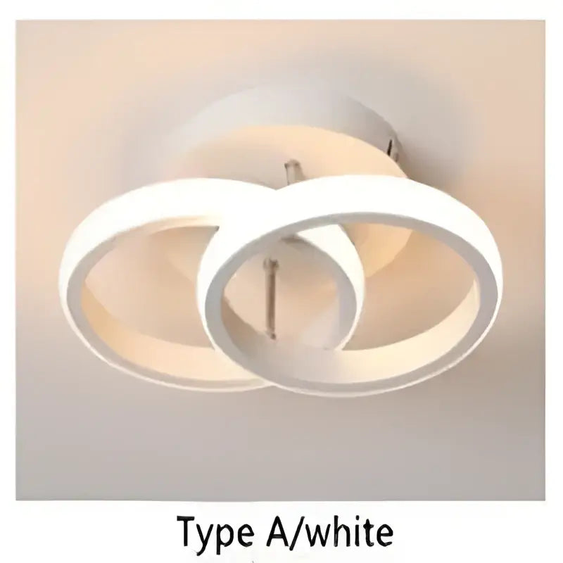 White circular decorbites led ceiling light with modern minimalist design featuring two interlocking rings for home lighting