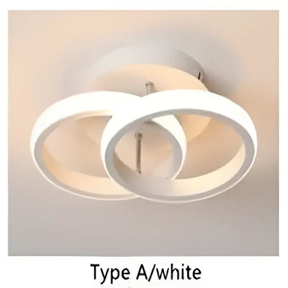White circular decorbites led ceiling light with modern minimalist design featuring two interlocking rings for home lighting
