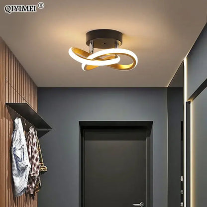 Modern gold and white DecorBites LED ceiling lights with sleek intertwined ring design for home living room illumination