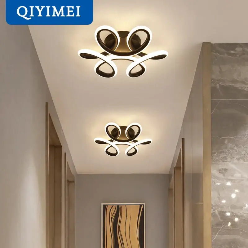 Modern gold-toned decorbites led ceiling lights with sleek intertwined loop design for living room and bedroom illumination