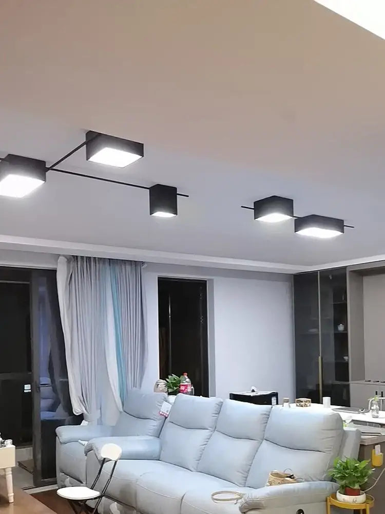 Modern black square decorbites led ceiling lights with sleek metallic arms for living room dining bedroom use