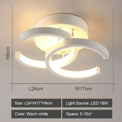 Modern white DecorBites LED ceiling lights with sleek interlocking circular rings and warm white glow for living room lighting