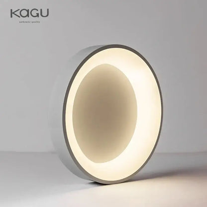 Modern circular led table lamp with white grey metallic finish and illuminated ring design for decorbites led ceiling lights