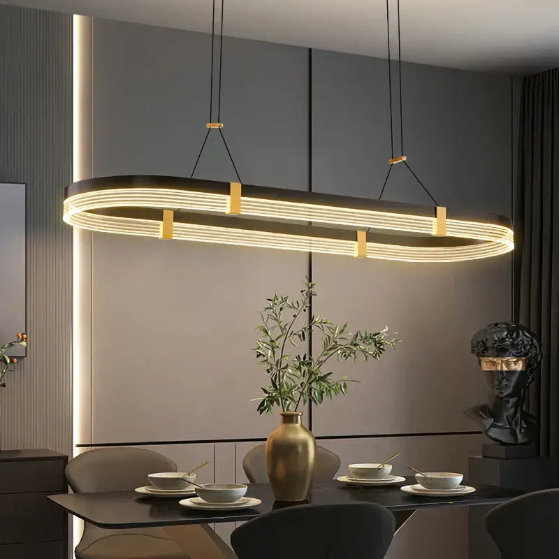 Modern oval pendant lights with glowing led strips and gold-toned metal accents decorbites led ceiling pendant