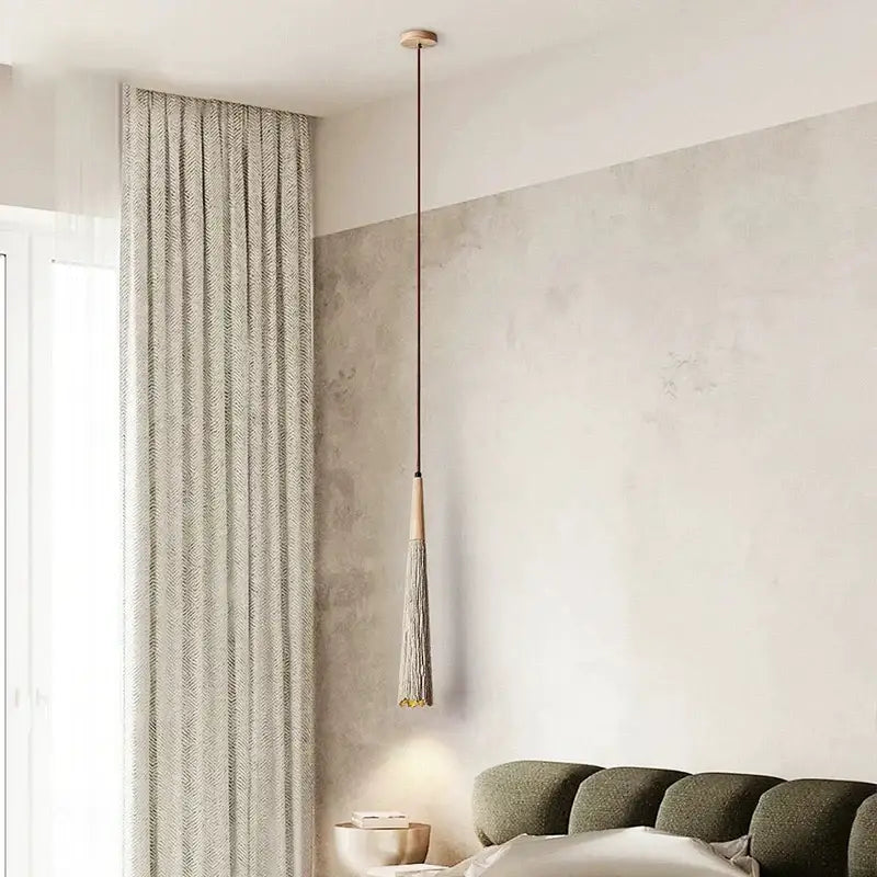 Minimalist pendant lamp decorbites led cement cream with slender wooden top dark cord and textured gray tassel for bedroom use