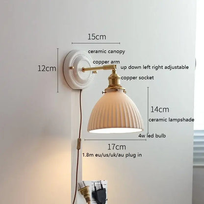 DecorBites™ LED ceramic wall lamp with copper arm, white ceramic canopy, and ribbed off-white ceramic lampshade