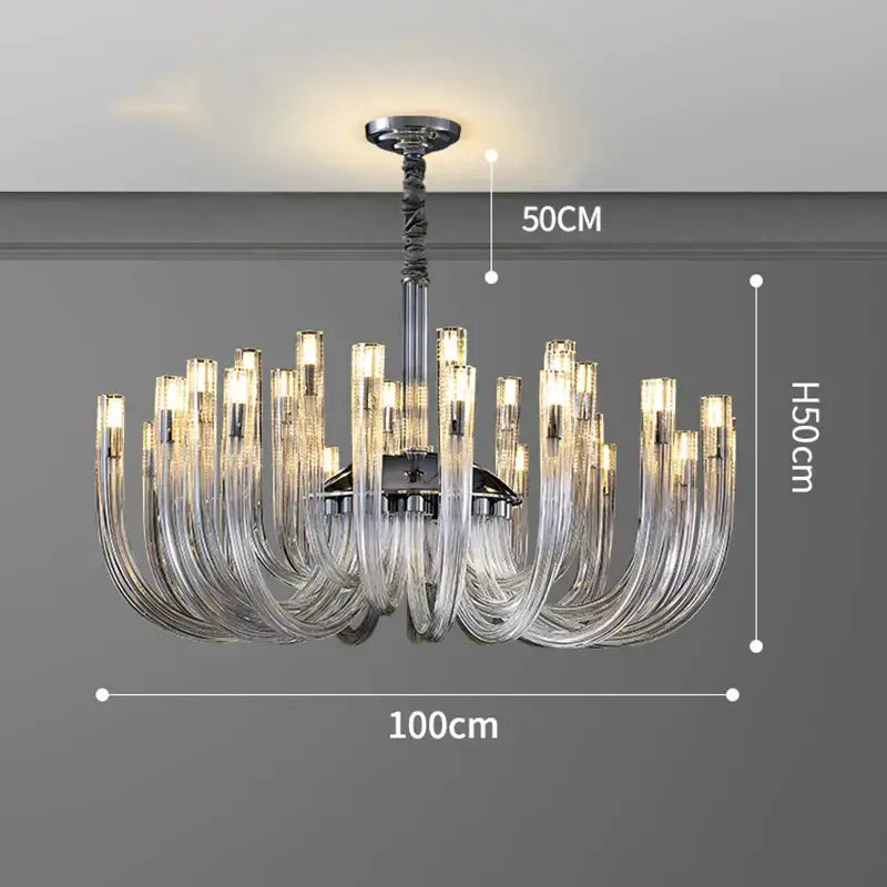 A modern chrome decorbites led chandelier with transparent glass arms for bedroom lighting fixture