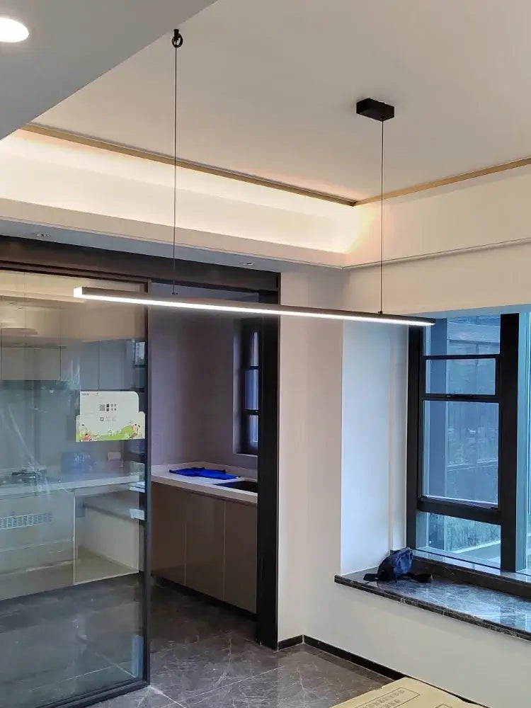 Modern black rectangular DecorBites LED chandelier with sleek linear design and integrated LED strip for dining room and kitchen