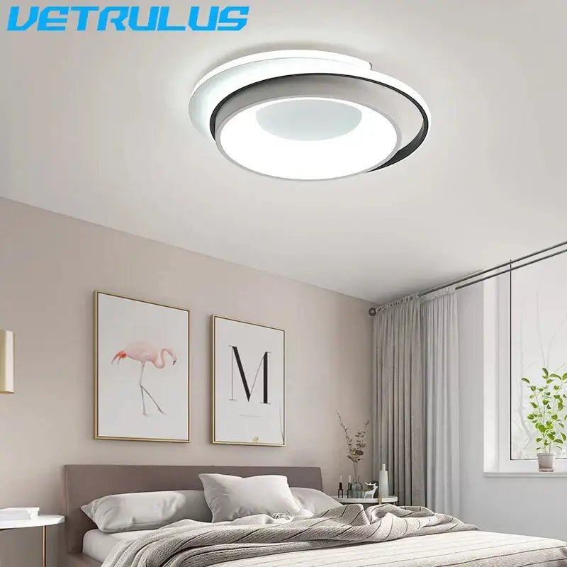 Modern circular decorbites led chandelier light with white and black acrylic concentric rings for living and dining room use