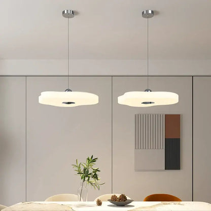 Two cloud shaped pendant lights with soft white diffuser and chrome fixtures in decorbites led chandelier design