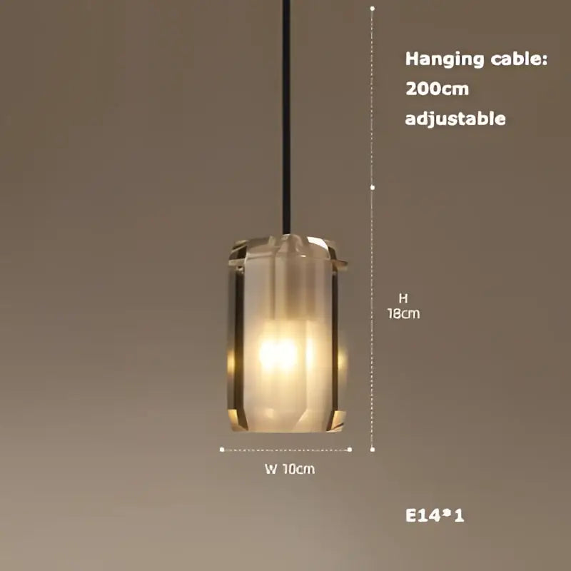 A modern decorbites led chandelier with a frosted glass shade and black cable for dining room lighting