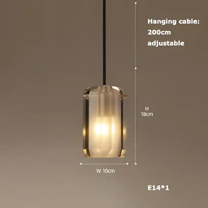 A modern decorbites led chandelier with a frosted glass shade and black cable for dining room lighting