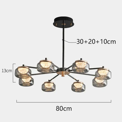 Modern black and brass decorbites led chandelier with eight clear glass globes for living and dining rooms