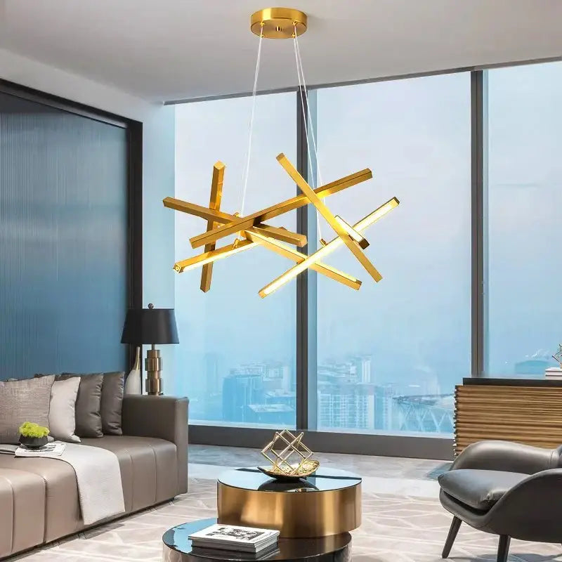 Gold-colored modern DecorBites LED chandelier with intersecting geometric bars for indoor pendant lamp lighting