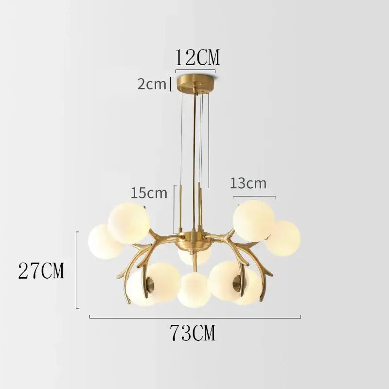 Gold-toned decorbites led chandelier with antler design and frosted glass globe shades for living room and dining room lighting