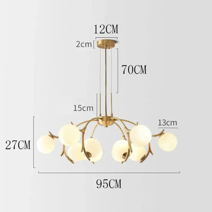 Gold-toned decorbites led chandelier lighting with six frosted glass globes for living room bedroom and dining room décor