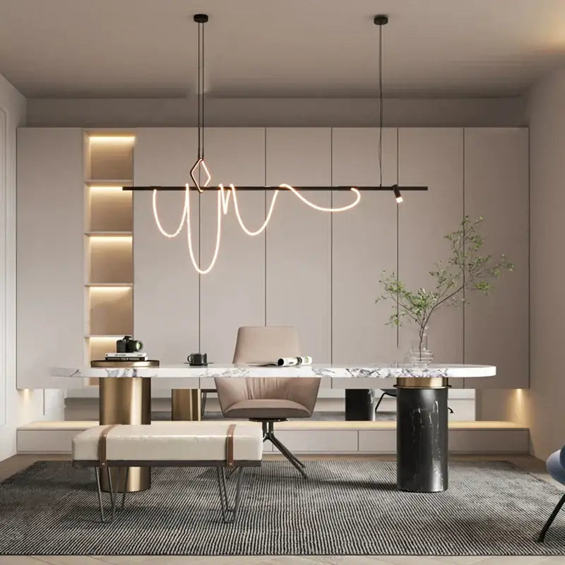 Modern minimalist DecorBites LED chandelier with sleek black frame and glowing white neon curves above marble desk