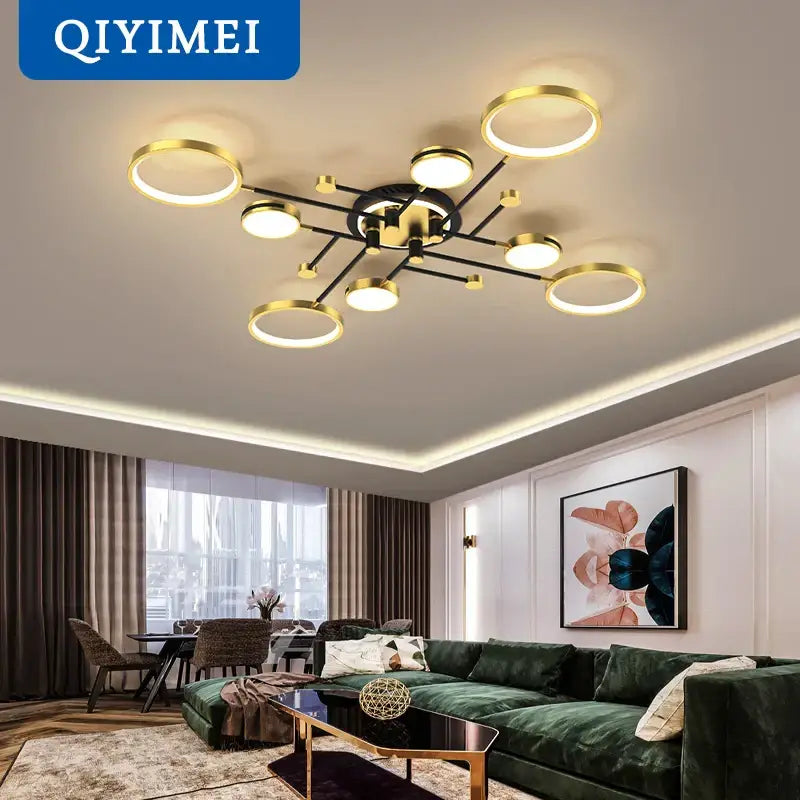 Gold-toned circular decorbites led chandelier with black arms and hub featuring multiple dimmable led chandelier lights