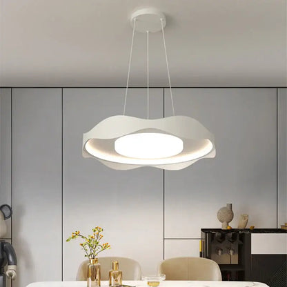 Modern white DecorBites LED chandelier with sleek layered circular design and soft ambient glow for indoor lighting