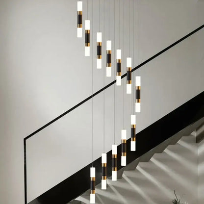 Modern minimalist decorbites led chandelier with white and black acrylic shades and gold accents for stairway lighting