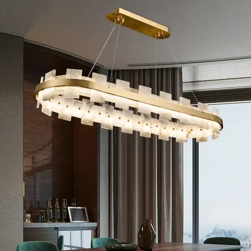 Gold-toned decorbites led chandelier with translucent layered glass panels and embedded led lights for stylish ceiling decor