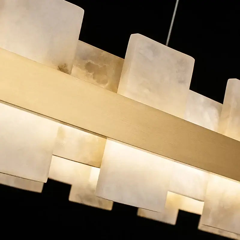 Modern led chandelier with milky white alabaster blocks on brushed brass bars for bedroom and living room decorbites led chandelier