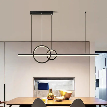 Modern black circular metal pendant light with sleek minimalist design and thin cords for warm white third gear ambiance