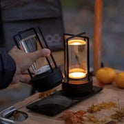 Black-framed led crystal table lamp with clear glass cylinder and warm rechargeable touch night light for bedside use