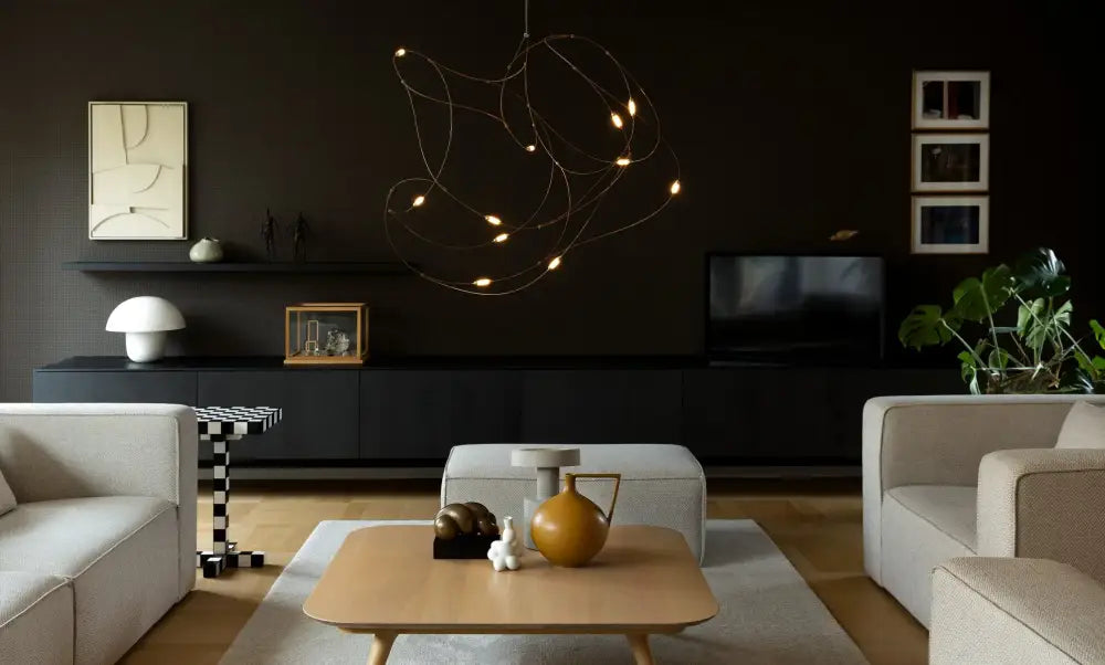 The DecorBites™ LED firefly chandelier features engineering minimal design above a light wooden minimalist coffee table