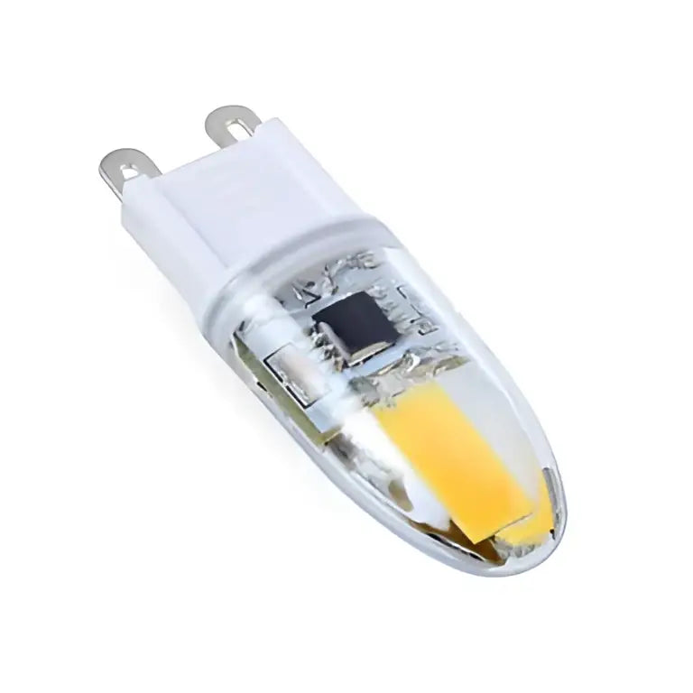 Clear glass decorbites led g9 bulbs with white base and yellowish light component for efficient lighting solution