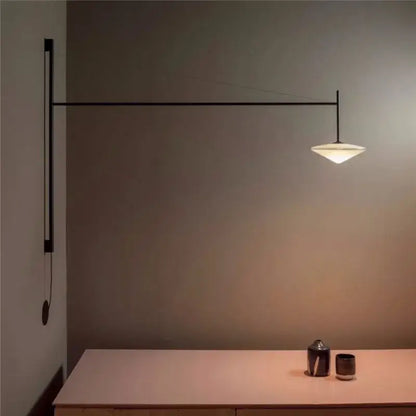 Minimalist black metal wall-mounted decorbites led glass art wall lamp with angular design and glowing white glass shade