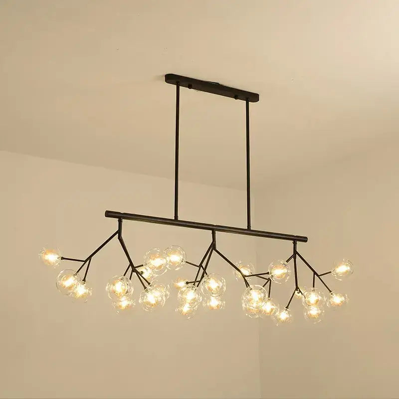 Black metal DecorBites LED glass ball branch chandelier with multiple clear globes in modern firefly design
