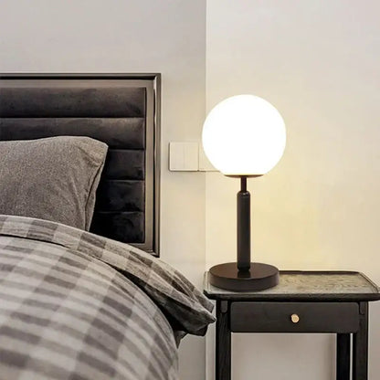 Modern black table lamp with a spherical frosted glass globe decorbites led glass ball for luxury home decor