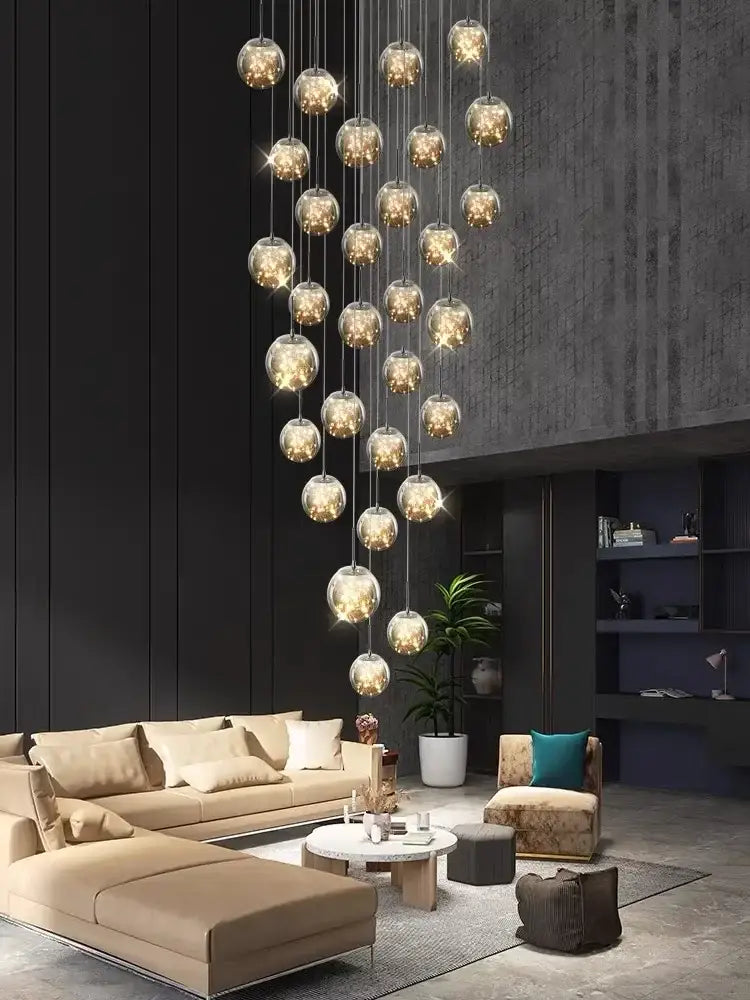 A decorbites led glass ball chandelier with multiple spherical glass globes emitting warm golden light for villa living rooms