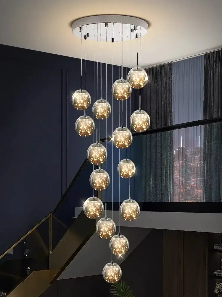 Modern chrome finished decorbites led glass ball chandelier with warm lights for duplex villa living room ambiance